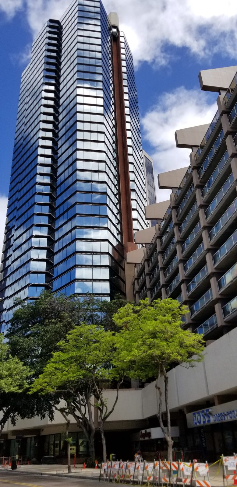 Downtown Honolulu towers rise over the Chinatown blocks, June 2019