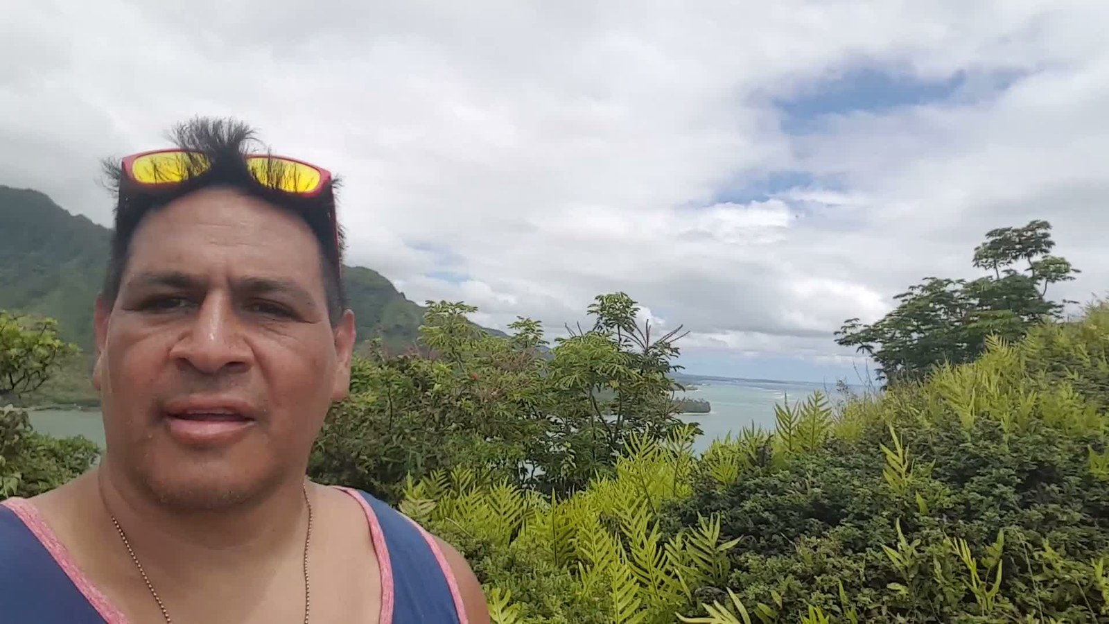 Michael on the trail with Kāneʻohe Bay in the distance, 2017