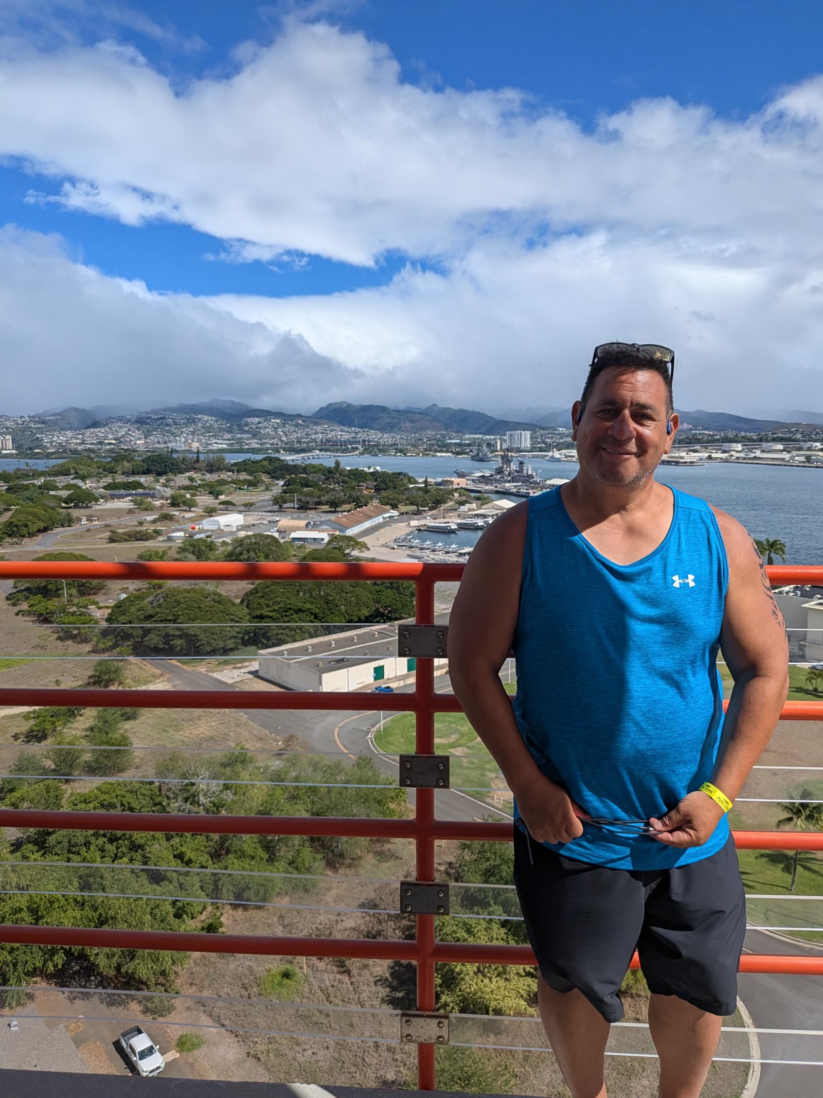 Michael at Ford Island with the USS Missouri in Pearl Harbor behind, November 2025