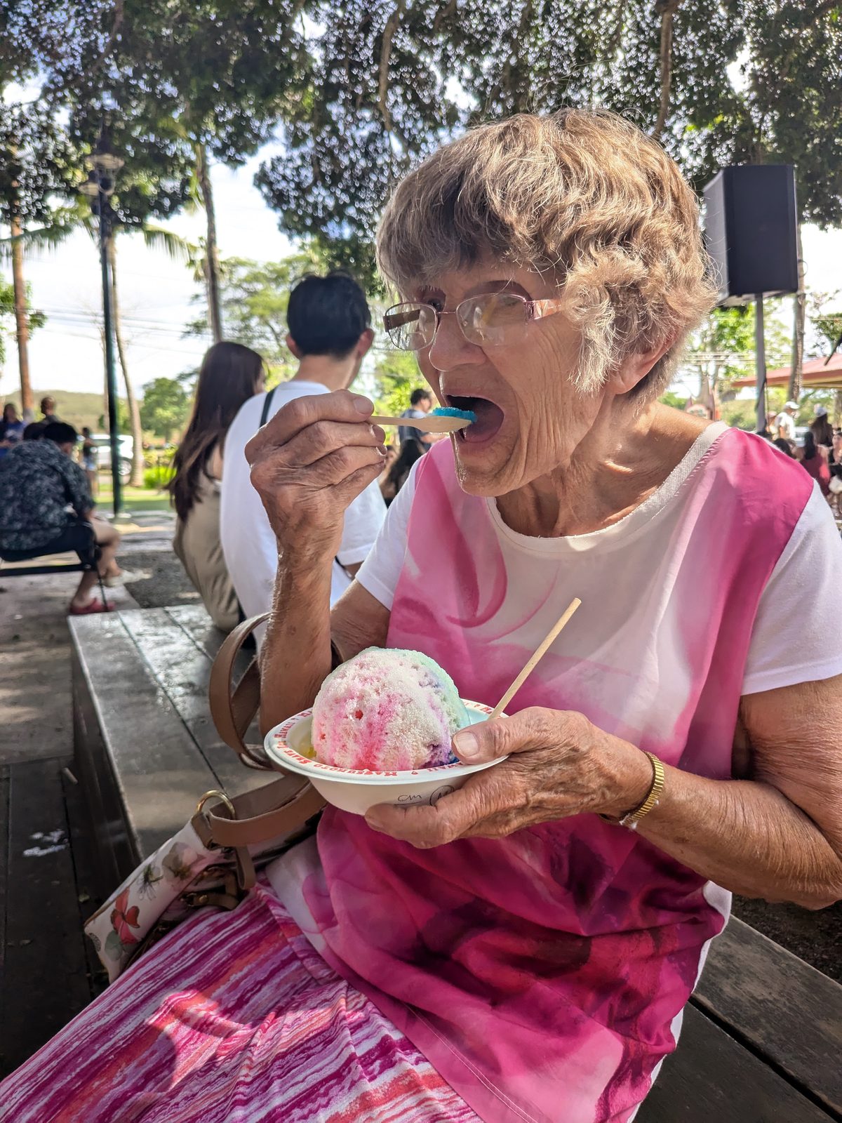 First bite of a Matsumoto's rainbow shave ice in Haleiwa, November 2024