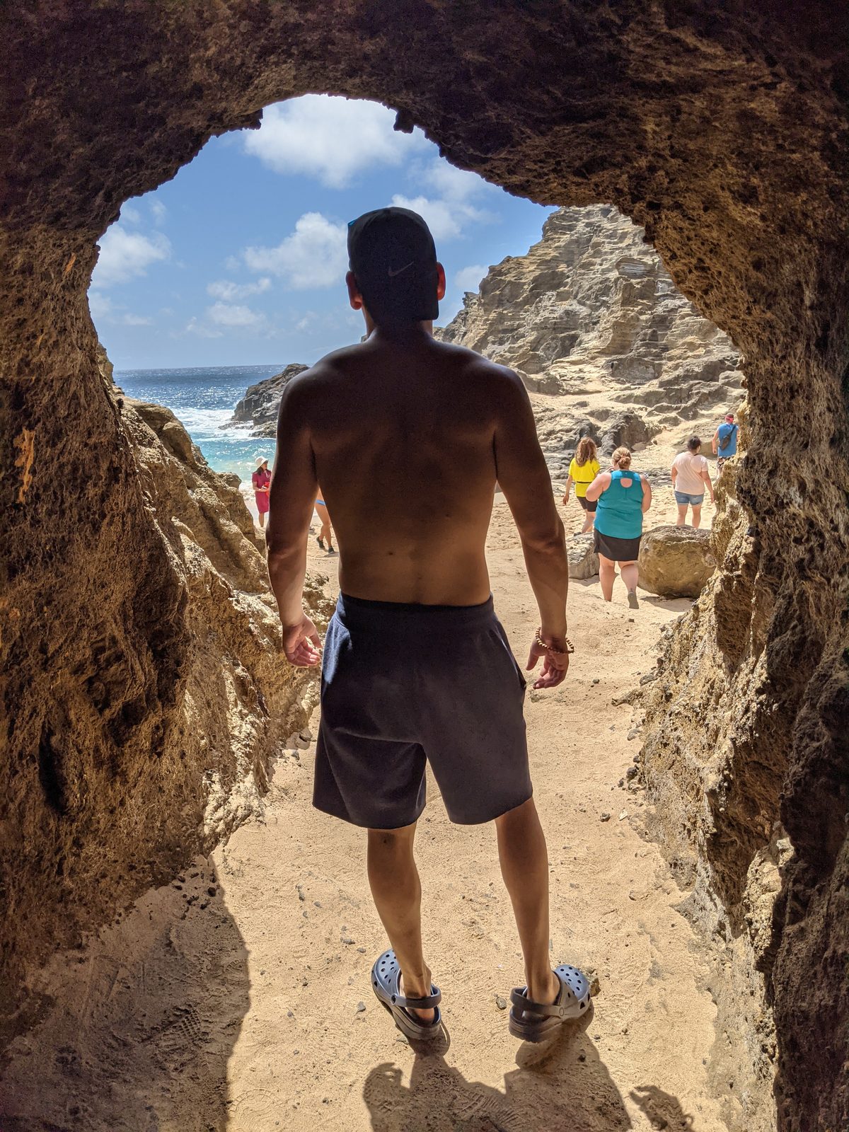 Through the lava arch at Halona Cove toward the surf, May 2021