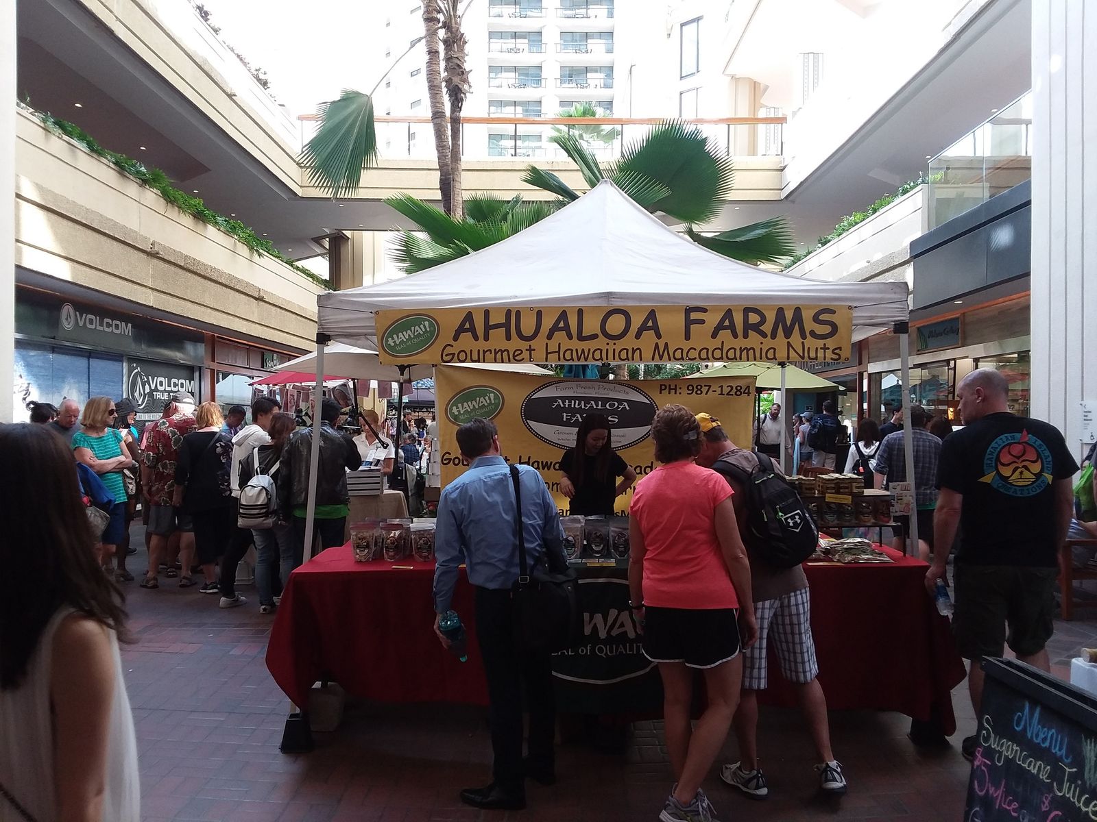 The Ahualoa Farms macadamia nut tent at the Waikiki Farmers Market in the Hyatt Regency atrium, March 2018