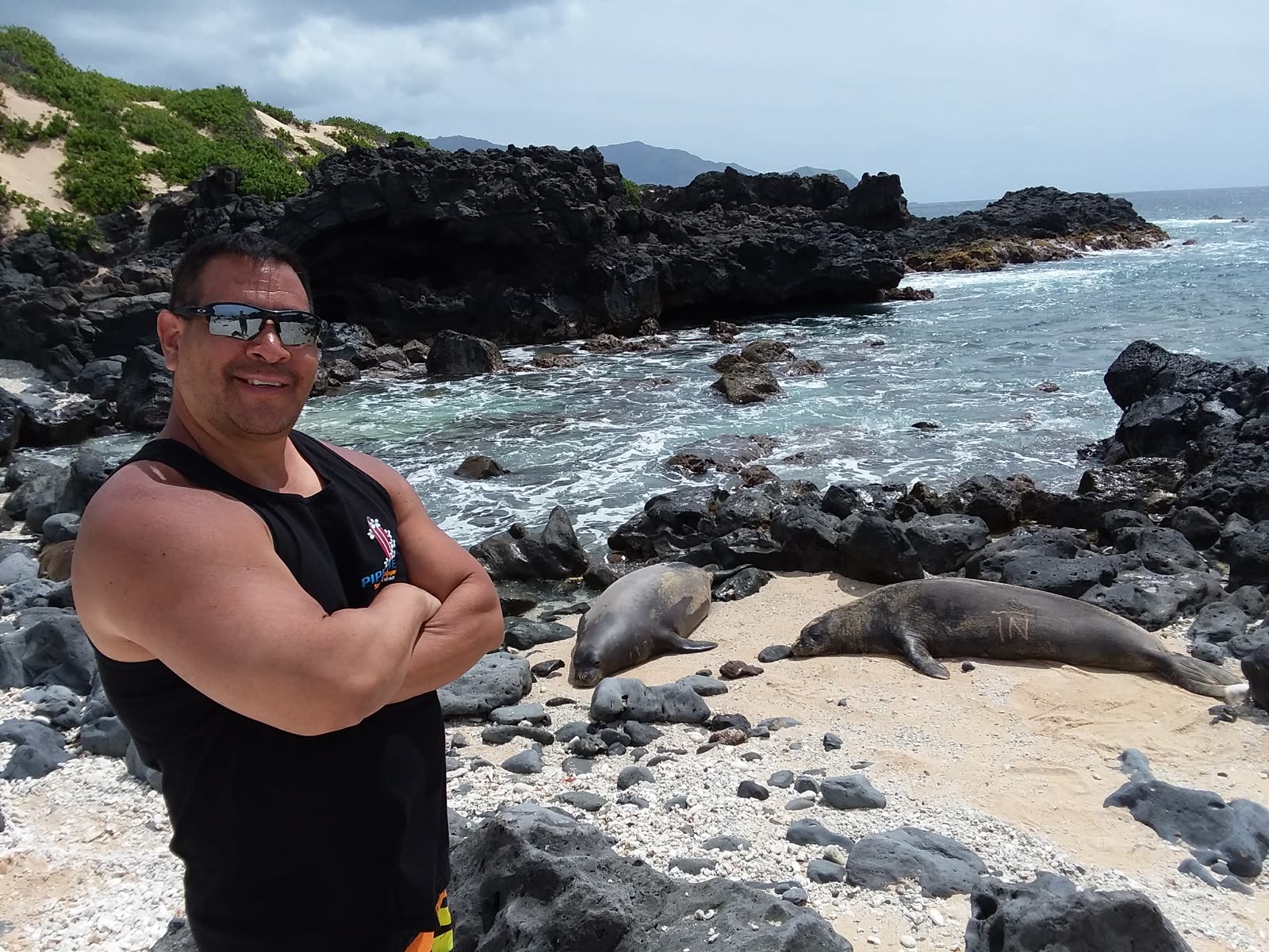 Michael with two monk seals at Ka’ena Point, March 2018