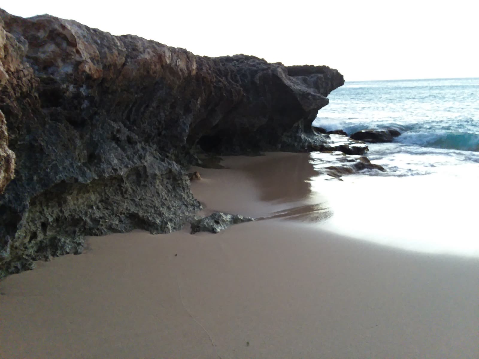 Rocky shoreline at Ka’ena Point at dusk, March 2018