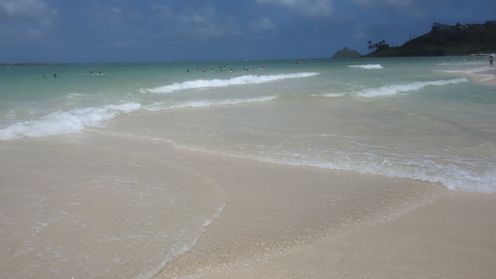 Gentle surf and swimmers at Kailua Beach
