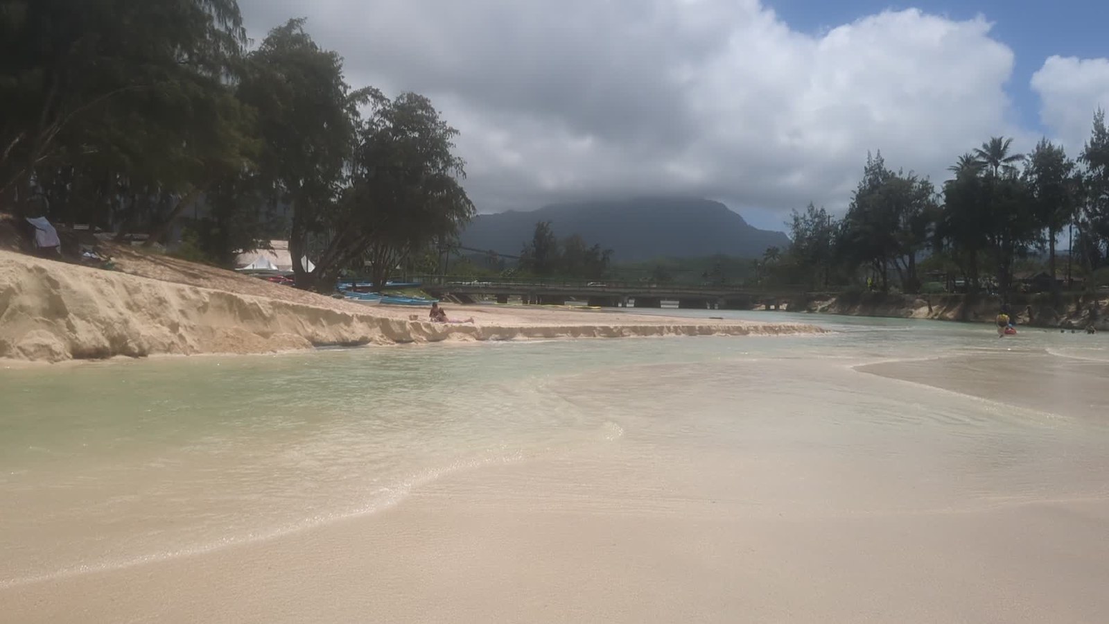 The Kaʻelepulu Stream mouth at Kailua Beach Park, with the bridge and Koʻolau mountains behind